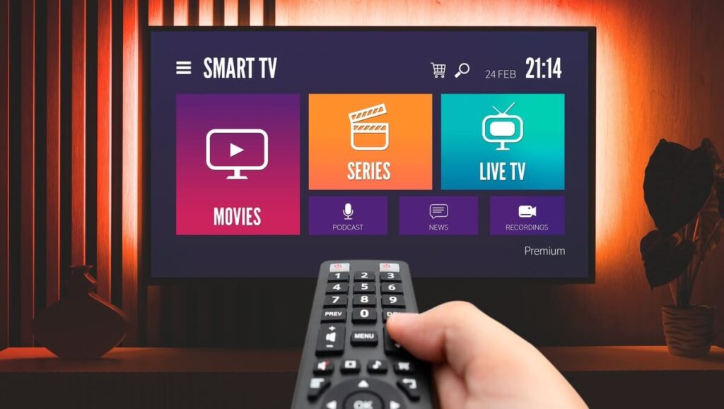 IPTV player app displaying live TV channels, movies, and electronic program guide on a smart TV